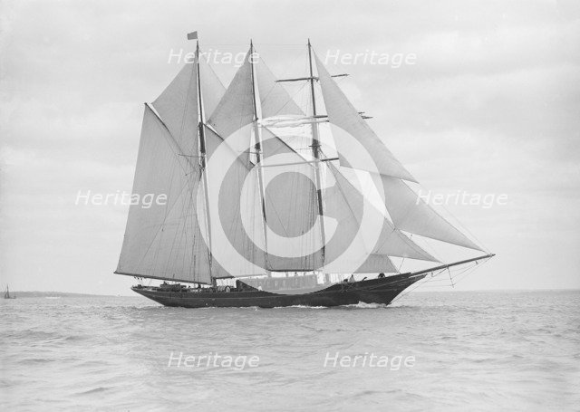 The auxiliary schooner 'La Cigale' sailing close-hauled, 1913. Creator: Kirk & Sons of Cowes.