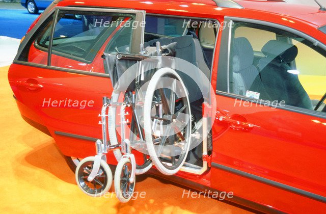 Wheelchair access into car. Artist: Unknown.
