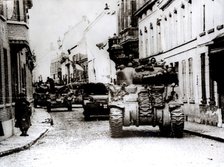 Polish tanks advance through the town of Tielt, Belgium, c1944. Artist: Unknown