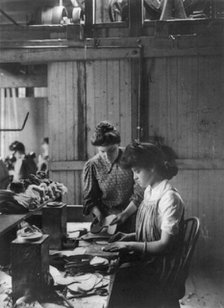 Shoe factories, Lynn, Mass.: 2 women working in shoe factory, (1895?). Creator: Frances Benjamin Johnston.
