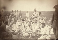 Siberian convicts taking lunch by the roadside (common criminals), between 1885 and 1886. Creator: Unknown.
