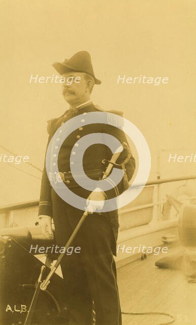 "Webber," a naval officer or ship captain, three-quarter length portrait, standing...,1894 or 95. Creator: Alfred Lee Broadbent.