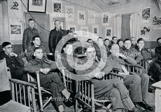 'Army Art Group: Adrian Hill, R.B.A., R.O.I., lecturing on The Art and Aims of Picasso', 1944. Artist: Unknown.