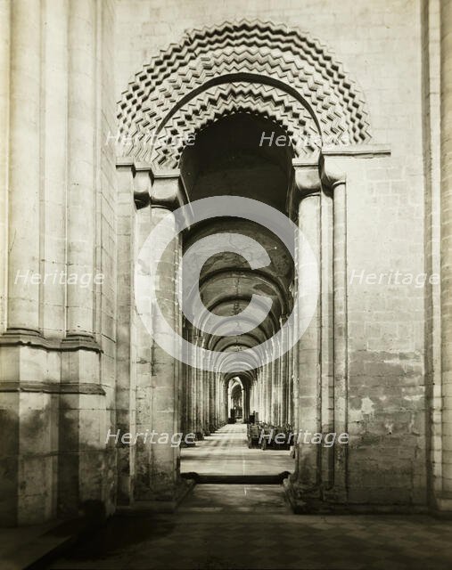Ely Cathedral: South Aisle to East, from Southwest Transept, 1891. Creator: Frederick Henry Evans.