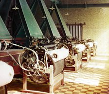 Cotton textile mill interior with machines producing cotton thread, probably..., between 1905-1915. Creator: Sergey Mikhaylovich Prokudin-Gorsky.