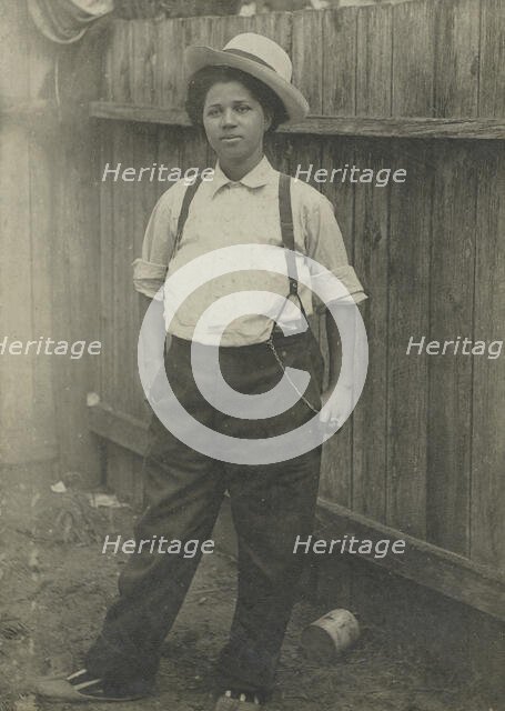 Woman dressed in men's clothing, c1890. Creators: G. Walter Roberts, Unknown.