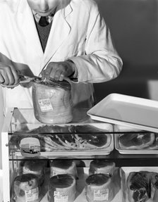 Pre-packed gammon steaks, Danish Bacon Company, Yorkshire, 1964. Artist: Michael Walters