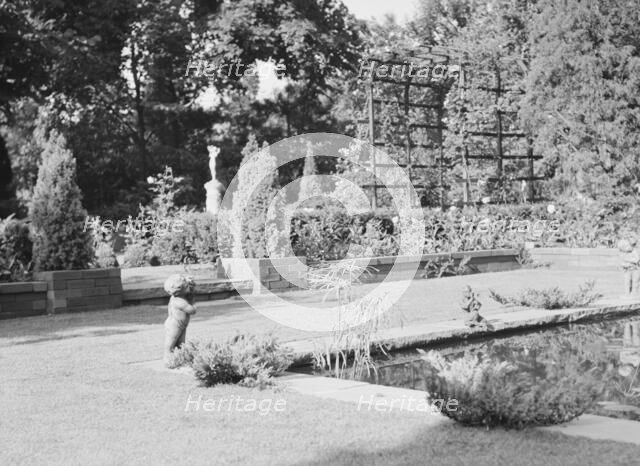 Garden, East Hampton, Long Island, between 1933 and 1942. Creator: Arnold Genthe.
