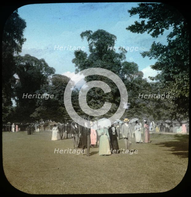 Well dressed ladies and gentlemen attending a sports day...Eton College,  Windsor, 1889. Creator: Henry Taunt.