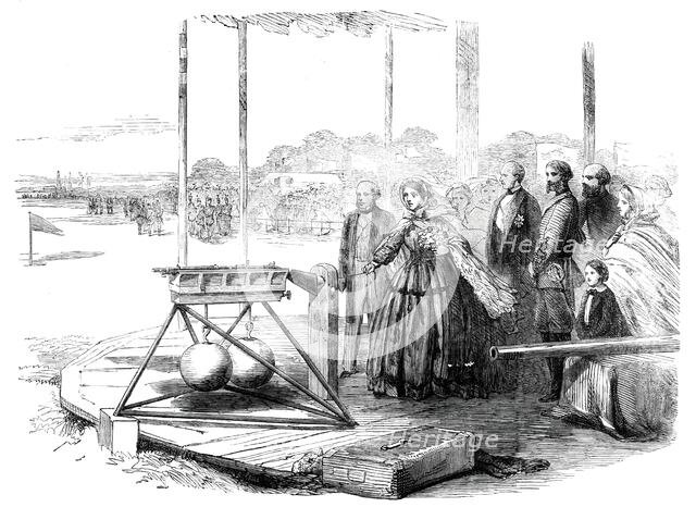 The Great Rifle-shooting Match on Wimbledon Common - Her Majesty firing the first shot, 1860. Creator: Unknown.