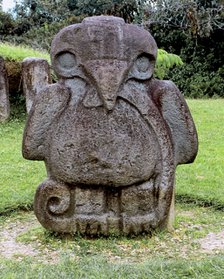 Archaeological park of San Agustín in Huila, Colombia. Eagle or condor with a snake in the beak a…