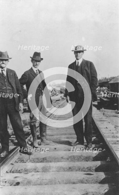At the new railroad left to right are: Mr. Edes, Frank G. Carpenter,..., between c1900 and 1916. Creator: Unknown.