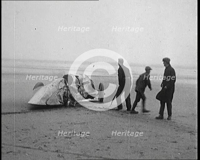Civilians Attending the Wreckage of a Speed Car, 1927. Creator: British Pathe Ltd.