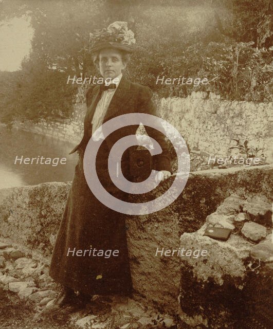 Frances Benjamin Johnston, full-length portrait, posing by a..., Cadenabbia, Lake Como, Italy, 1900. Creator: Unknown.