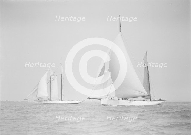 The ketch 'Cariad' and schooner 'Irma' racing downwind, 1911. Creator: Kirk & Sons of Cowes.