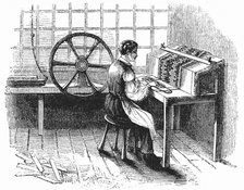 Man operating machine punching cards for Jacquard looms, 1844. Artist: Unknown