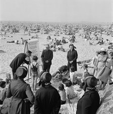 The Salvation Army runs a children's beach mission on the sand, Blackpool, c1946-c1955. Artist: John Gay