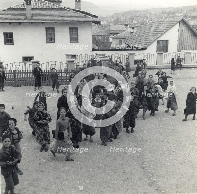 Schoolchildren in the playground, Sarajevo, Bosnia-Hercegovina, Yugoslavia, 1939. Artist: Unknown