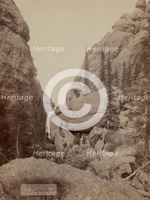 Our picnic party at Sunday Gulch Photographed between the walls of the grandest mountain..., 1891. Creator: John C. H. Grabill.