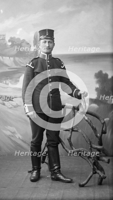 An army lance-corporal in uniform and boots with spurs, Landskrona, Sweden, 1910. Artist: Unknown