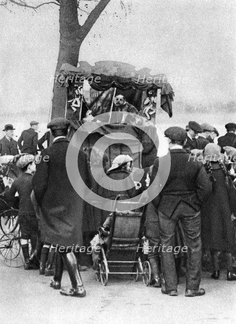 Punch and Judy show in Putney, London, 1926-1927. Artist: Unknown