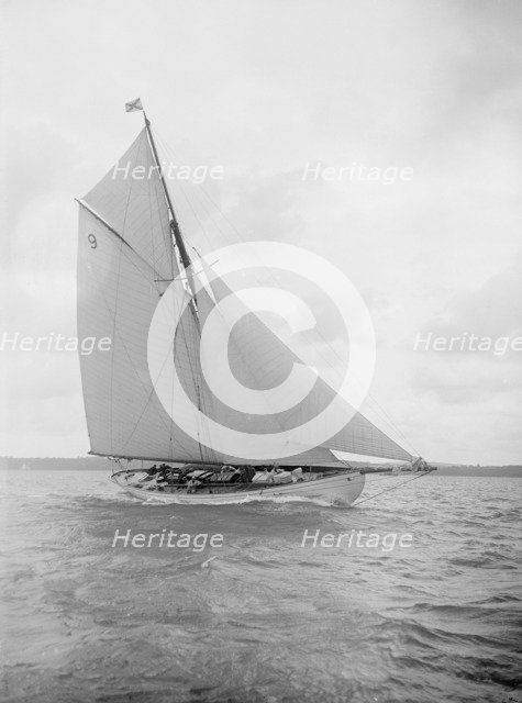 The cutter 'Westwind' sailing close-hauled, 1912. Creator: Kirk & Sons of Cowes.