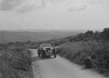 MG TA of JL Lutwyche competing in the MCC Torquay Rally, 1938. Artist: Bill Brunell.