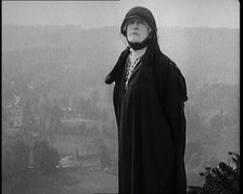 Dame Ellen Terry Standing on a Hill Looking at the View, 1920s. Creator: British Pathe Ltd.