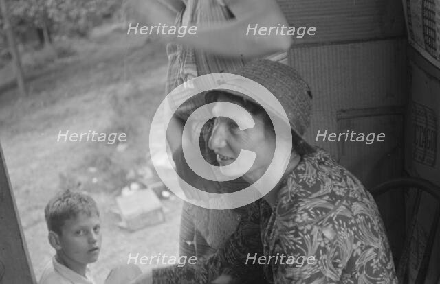 Farm woman in conversation with relief investigator, West Virginia, 1935. Creator: Walker Evans.