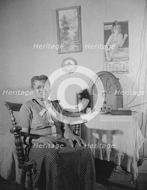 Elderly lady who lives on Lamont Street, N.W., Washington, D.C., 1942. Creator: Gordon Parks.