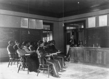 Students in class learning how to prepare sulphuric acid, Hampton Inst..,  Va., between 1899 & 1900. Creator: Frances Benjamin Johnston.