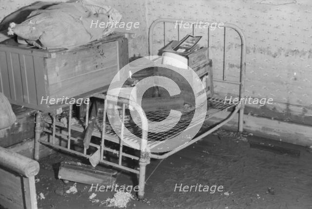 Interior of a farmhouse near Ridgeley, Tennessee, after the 1937 flood waters had subsided, 1937. Creator: Walker Evans.