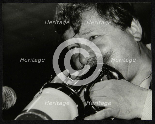 Trumpeter Janusz Carmello performing at The Fairway, Welwyn Garden City, Hertfordshire, 1991. Artist: Denis Williams