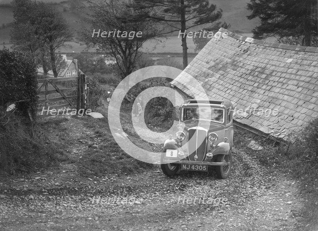 Standard Nine taking part in a Standard Car Owners Club trial. Artist: Bill Brunell.