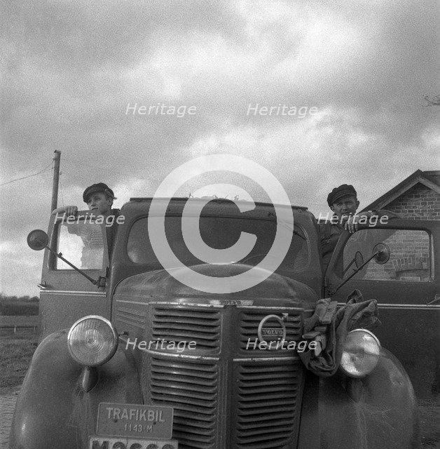 Men with a lorry at the sugar mill in Arlöv, Scania, Sweden, c1940s(?). Artist: Otto Ohm