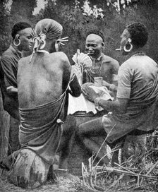 Kenyan men playing cards, 1922. Artist: Unknown