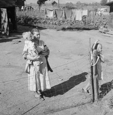 Family living in shacktown community, mostly from Kansas and..., Washington, Yakima Valley, 1939. Creator: Dorothea Lange.