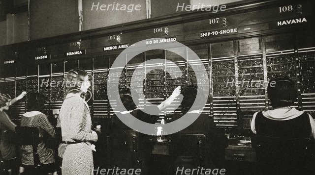 Female workers in the telephone room, New York Stock Exchange, USA, early 1930s. Artist: Unknown