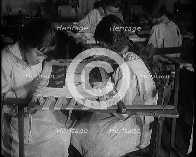 Young Female Civilians Learning Embroidery in an Arts Class, 1920. Creator: British Pathe Ltd.