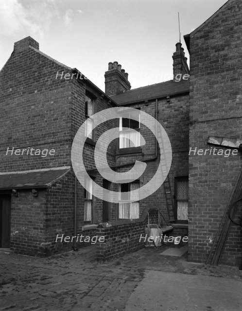 Typical pit housing in Furlong Road, Bolton upon Dearne, South Yorkshire, 1963.  Artist: Michael Walters