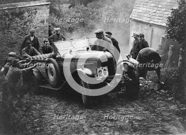 Morris or MG 14/28 of MH Fortlage receiving a push in the JCC Lynton Trial, 1932. Artist: Bill Brunell.