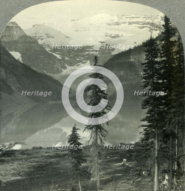 'Lake Louise, the "Queen of Lakes", and Mount Victoria. Alberta, Canada.', c1930s. Creator: Unknown.