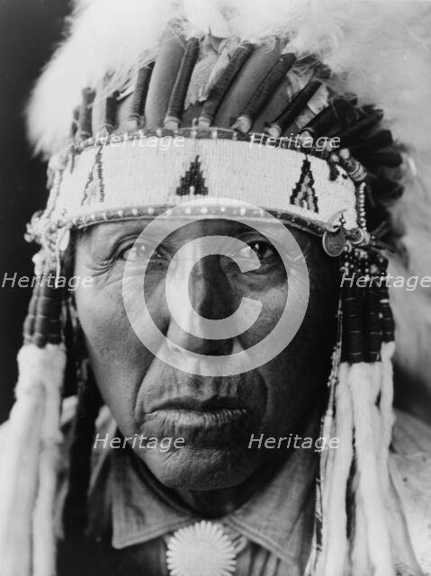 Red Bird-Cheyenne, c1927. Creator: Edward Sheriff Curtis.