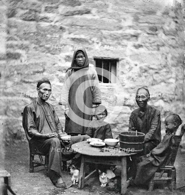Kowloon, Hong Kong, China: a Chinese family, 1869. Creator: John Thomson.