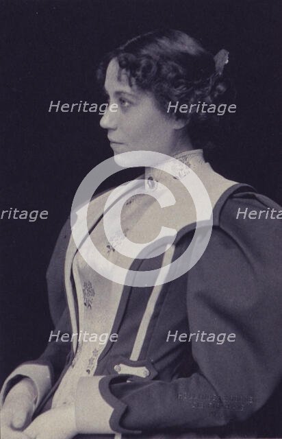 Young woman wearing high collared blouse and mutton-sleeved jacket, facing left..., c1900. Creator: Hollinger & Rockey.