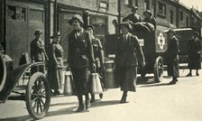 Women reservists delivering milk to a hospital, First World War, c1914-1918, (c1920). Creator: Unknown.