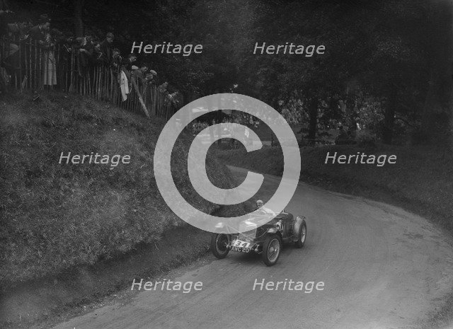 Riley TT Sprite competing in the Shelsley Walsh Hillclimb, Worcestershire, 1935. Artist: Bill Brunell.