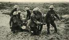 'Red Cross Work in the Flanders Mud', First World War, 1 August 1917, (c1920). Creator: Unknown.