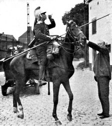 ''L'aide Francaise a la Belgique; Un paysan offre a boire a une estafette', 1914. Creator: Unknown.