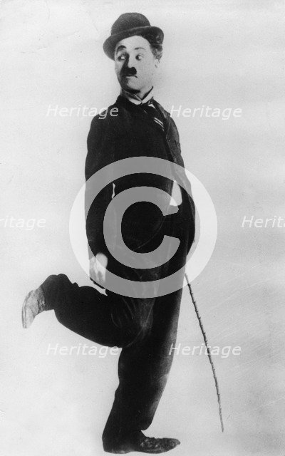 British comedian, actor and film director Charlie Chaplin in character, 20th century. Artist: Unknown